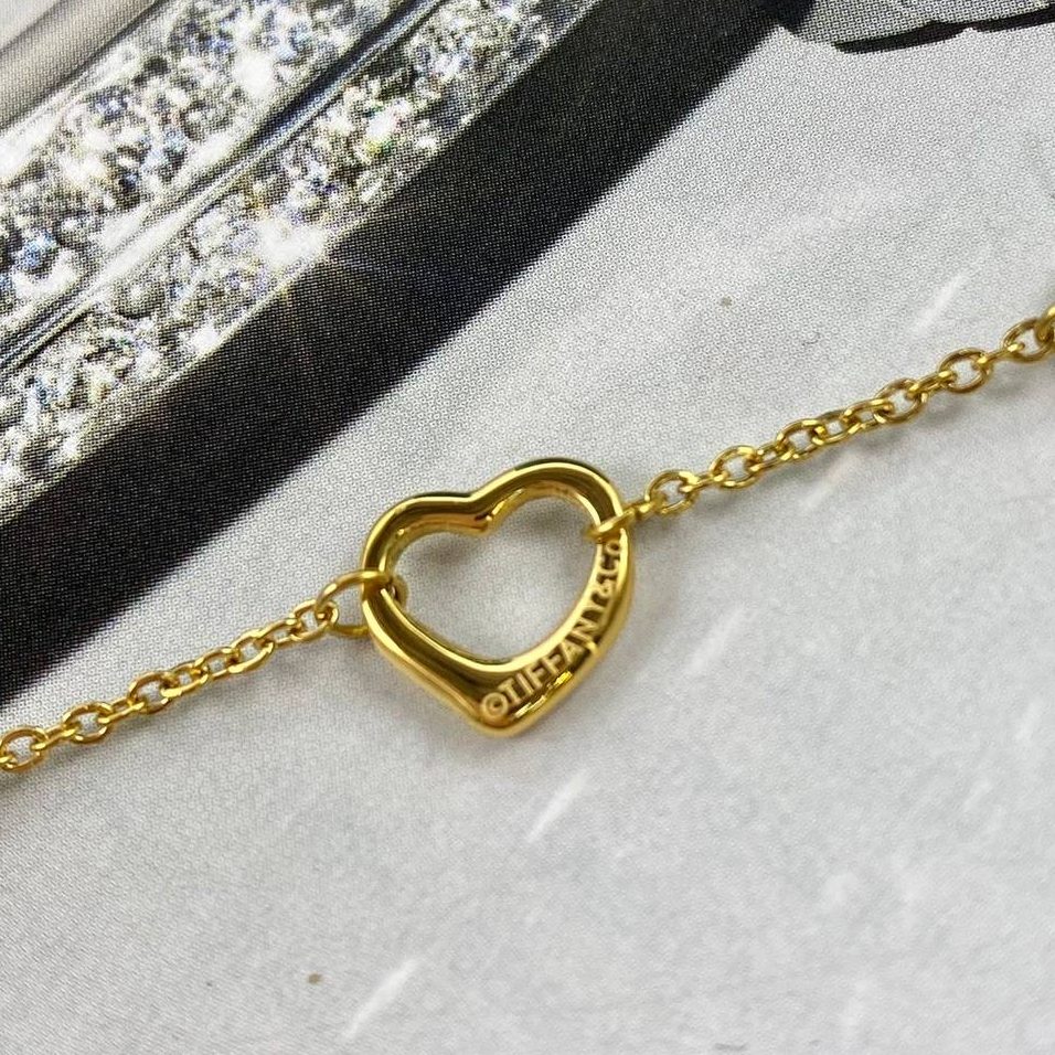 Фото Колье Tiffany & Co Open Heart 10301