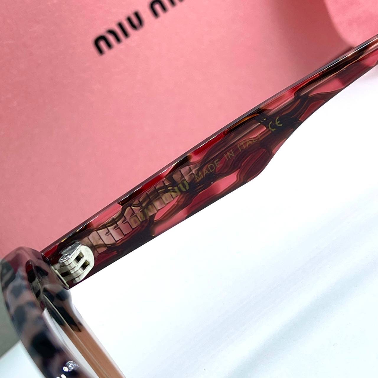 Фото Очки Miu Miu B2499