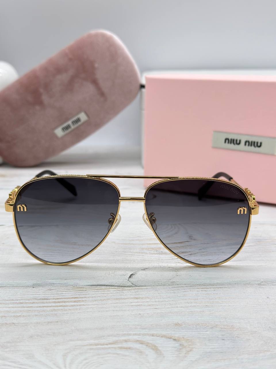 Фото Очки Miu Miu B3274