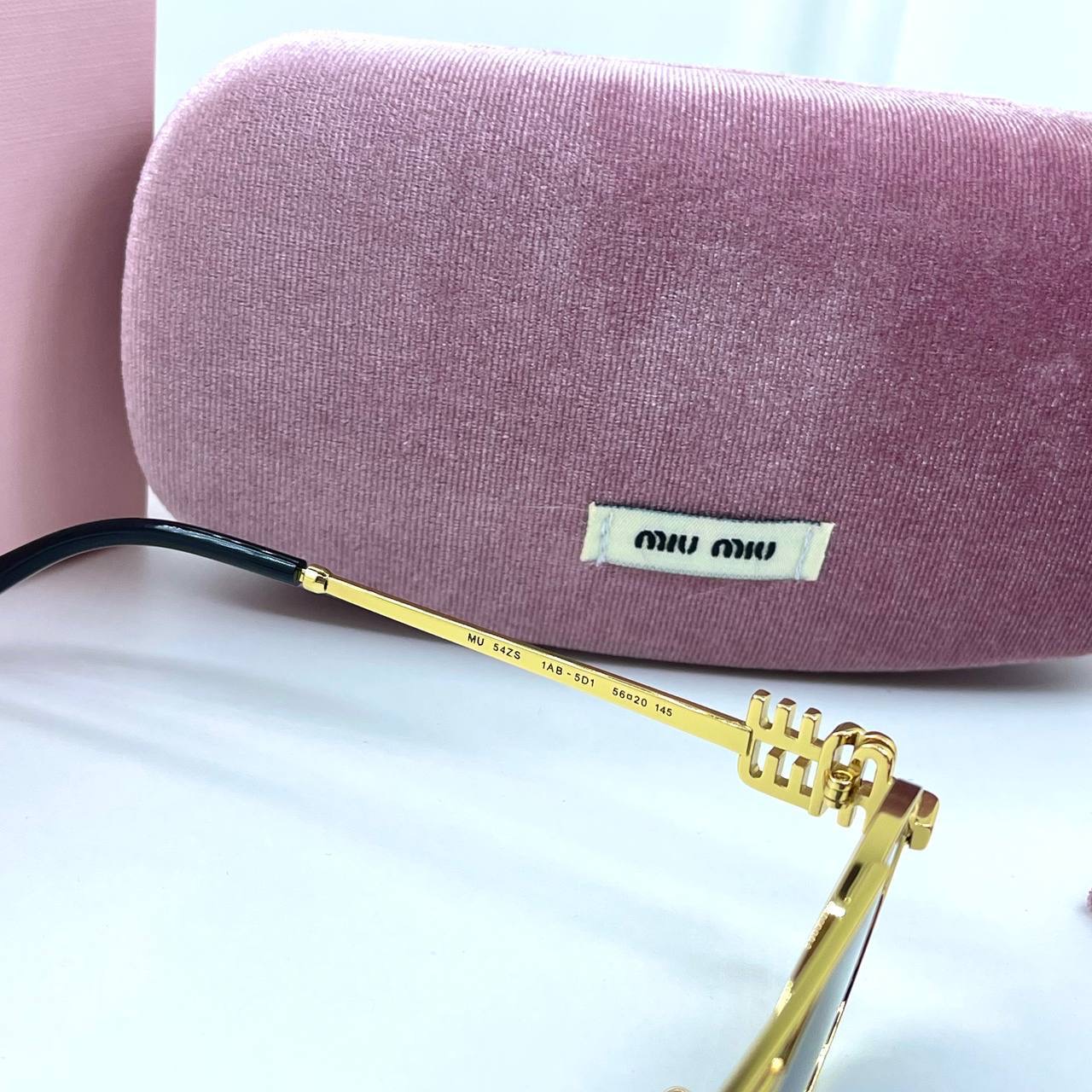 Фото Очки Miu Miu Logo B3457