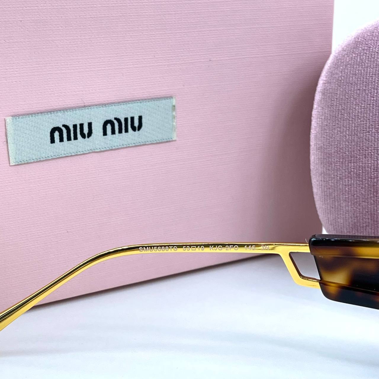 Фото Очки Miu Miu B3460