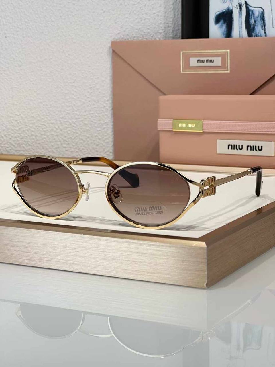 Фото Очки Miu Miu Logo S6349