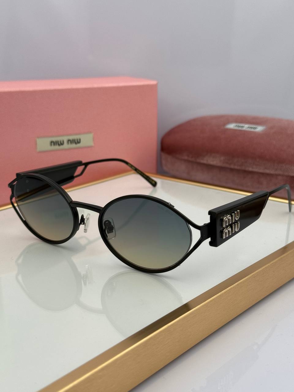 Фото Очки Miu Miu S7562