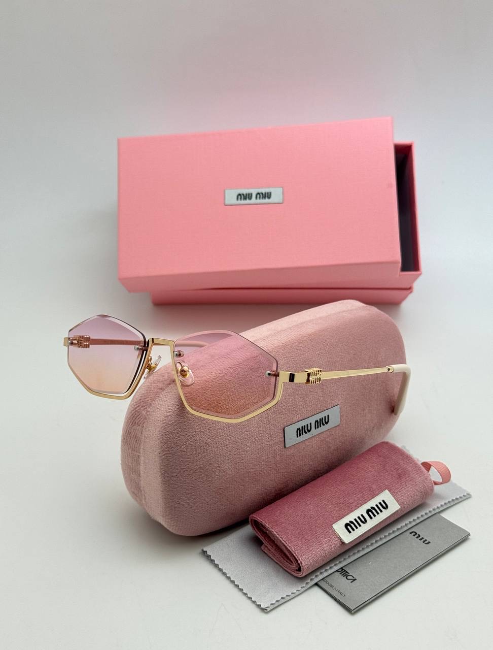 Фото Очки Miu Miu S10616