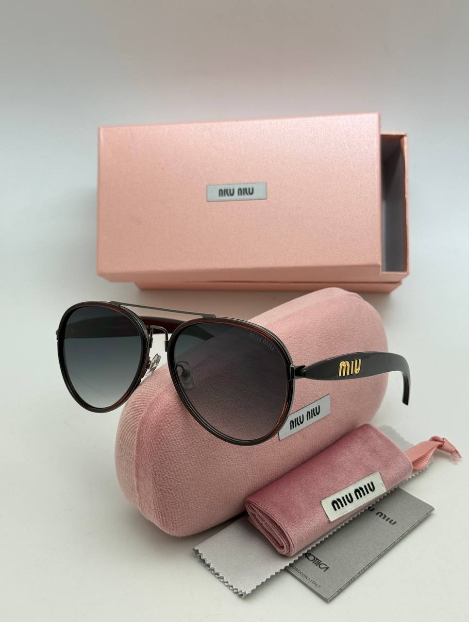 Фото Очки Miu Miu S10211
