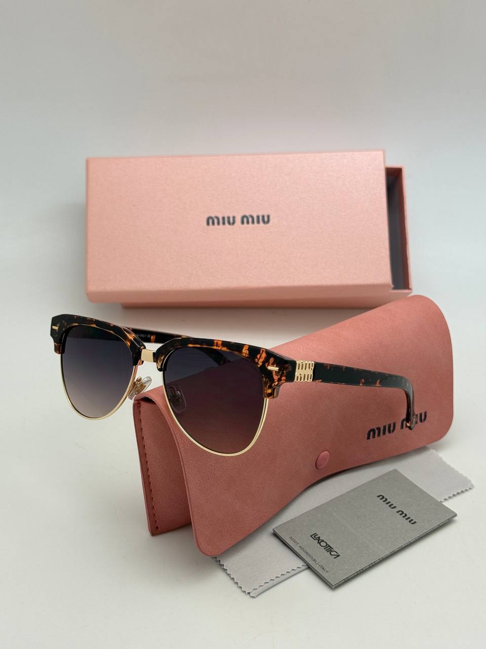 Фото Очки Miu Miu S10318