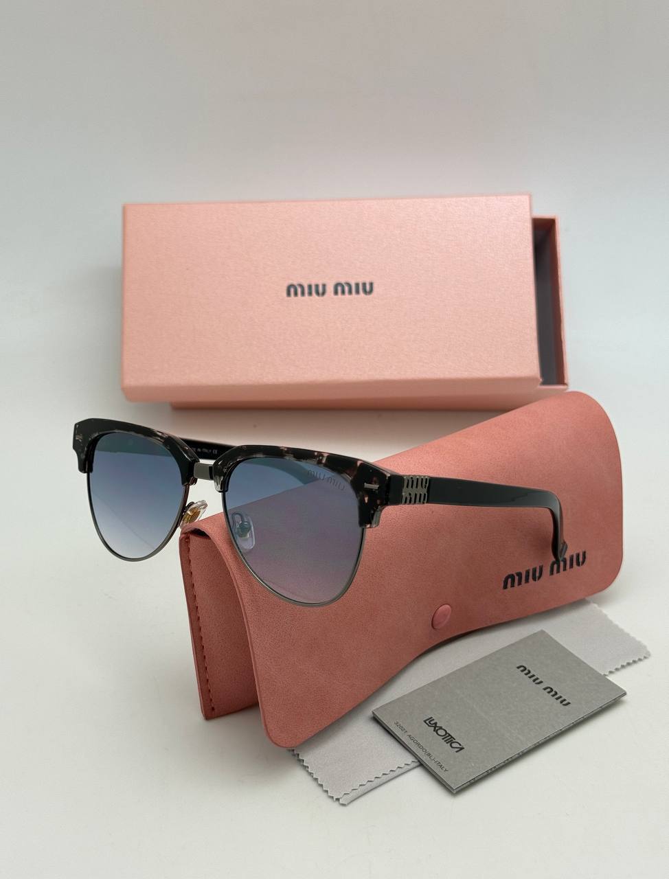 Фото Очки Miu Miu S10319