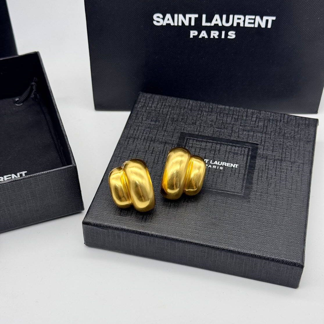 Фото Серьги-клипсы Yves Saint Laurent Bumpy Double Disk B5400