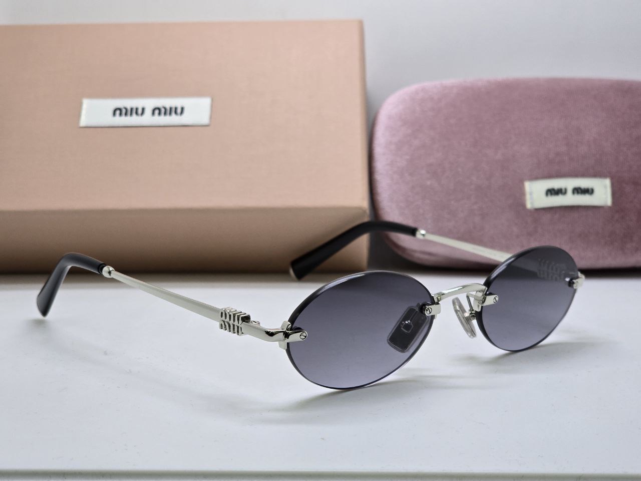 Фото Очки Miu Miu Logo B5649