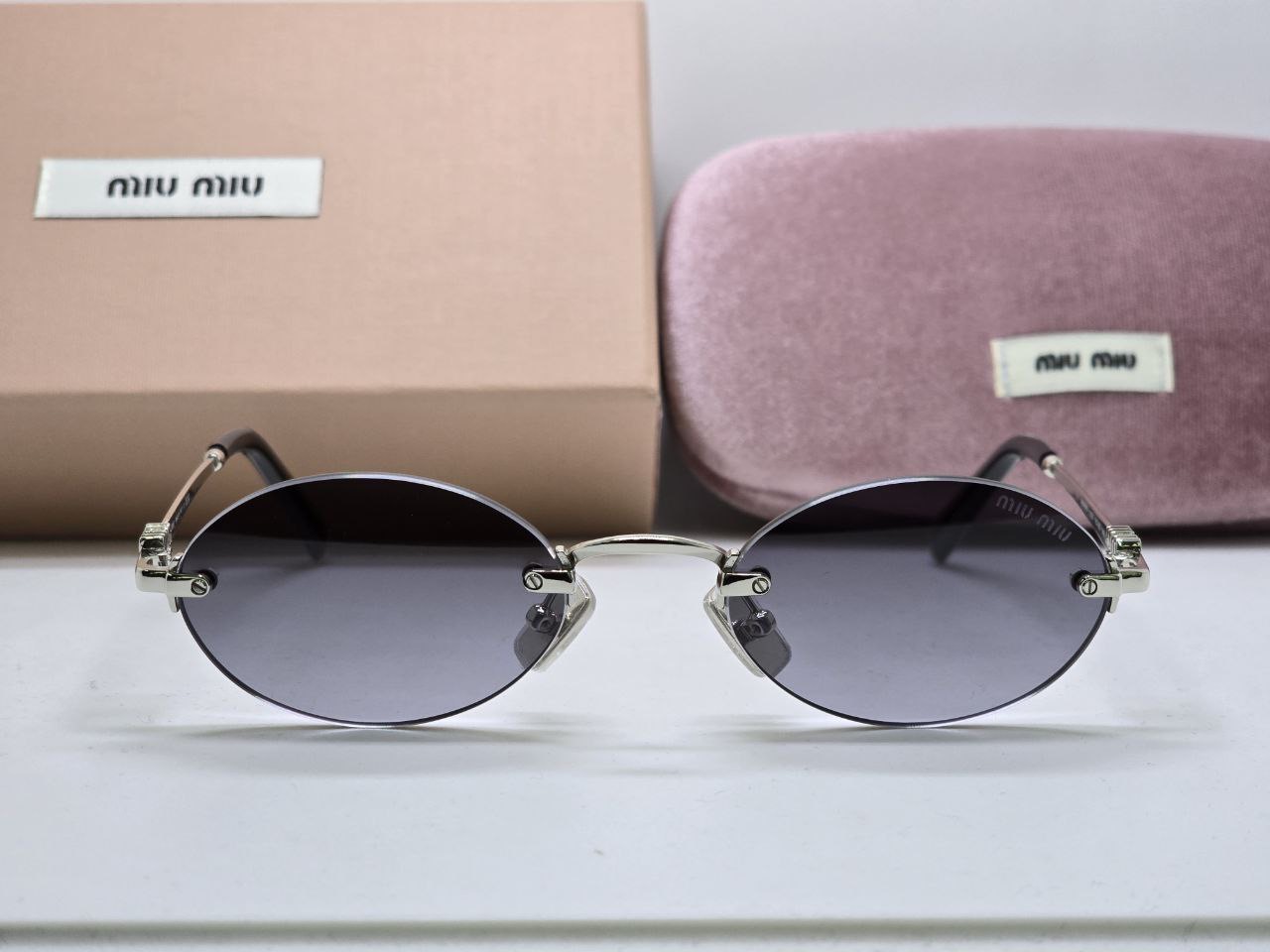 Фото Очки Miu Miu Logo B5649