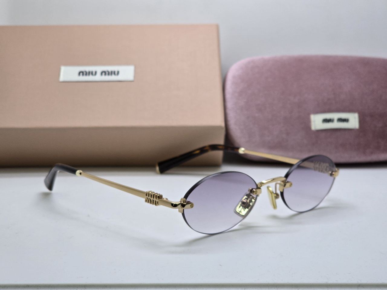 Фото Очки Miu Miu Logo B5650