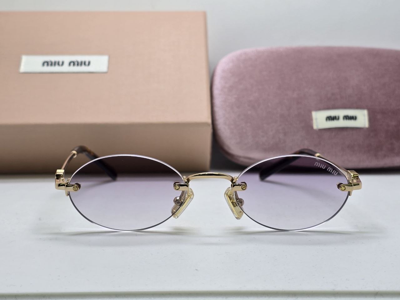 Фото Очки Miu Miu Logo B5650