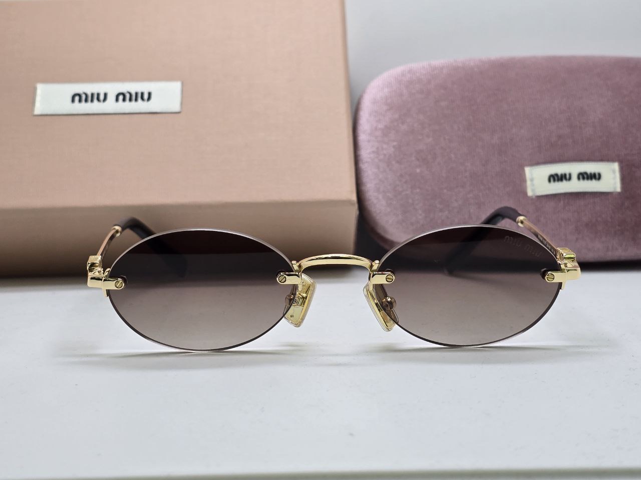Фото Очки Miu Miu Logo B5651
